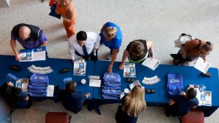 Job seekers attends the JobNewsUSA.com South Florida Job Fair on June 26, 2024 in Sunrise, Florida.