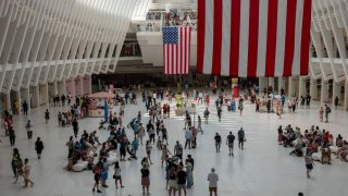 People walk through a Manhattan mall on July 05, 2024 in New York City.