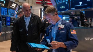 Traders work on the floor of the New York Stock Exchange (NYSE) on July 11, 2024 in New York City.