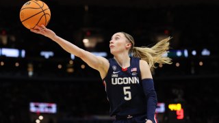 Paige Bueckers, #5 of the UConn Huskies, shoots the ball in the second half during the NCAA Women’s Basketball Tournament Final Four semifinal game against the Iowa Hawkeyes at Rocket Mortgage FieldHouse in Cleveland, Ohio, on April 5, 2024.