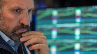 Traders work on the floor of the New York Stock Exchange (NYSE) on August 1, 2024 in New York City. 