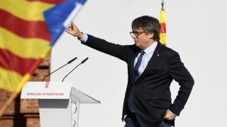 BARCELONA, SPAIN – AUGUST 08: Former Catalan President Carles Puigdemont makes his first public appearance since he fled Spain in 2017, speaking at a public rally in Barcelona, Spain on August 08, 2024. Since leading the failed 2017 independence push for Catalonia to break away from Spain, he has been wanted by the Spanish justice system. Catalan police had the order to arrest him immediately, but Puigdemont managed to speak for several minutes outside of the Catalan parliament. After the rally, he disappeared. (Photo by Adria Puig/Anadolu via Getty Images)