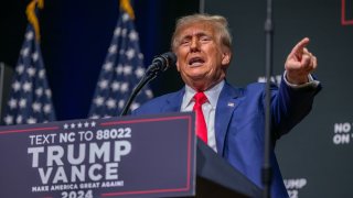 Republican presidential nominee former President Donald Trump speaks at a campaign event at Harrah’s Cherokee Center on August 14, 2024 in Asheville, North Carolina. 