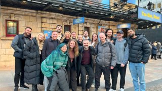 Aisha Khan (front, left) is a California-based recruiter who leveraged her company’s business travel program to spend a week in London in March.