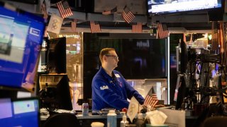 A trader works on the floor of the New York Stock Exchange on Aug. 23, 2024.