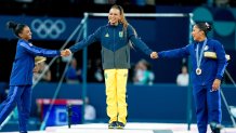 Simone Biles and Jordan Chiles congratulate gold medalist Rebeca Andrade