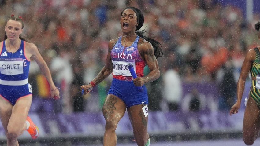 ShaCarri Richardson celebrates a gold in 4x100m relay