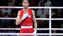 Taiwan's Lin Yu-ting reacts after defeating Uzbekistan's Sitora Turdibekova in their women's 57 kg preliminary boxing match at the 2024 Summer Olympics, Friday, Aug. 2, 2024, in Paris, France. (AP Photo/John Locher)