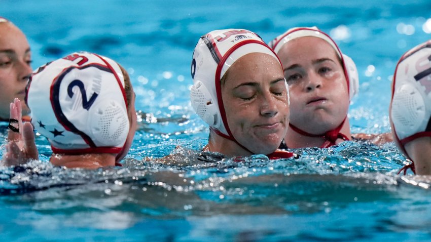 United States' players react after loosing the women's bronze medal water polo match against Netherlands at the 2024 Summer Olympics, Saturday, Aug. 10, 2024, in Paris, France. (AP Photo/Luca Bruno)