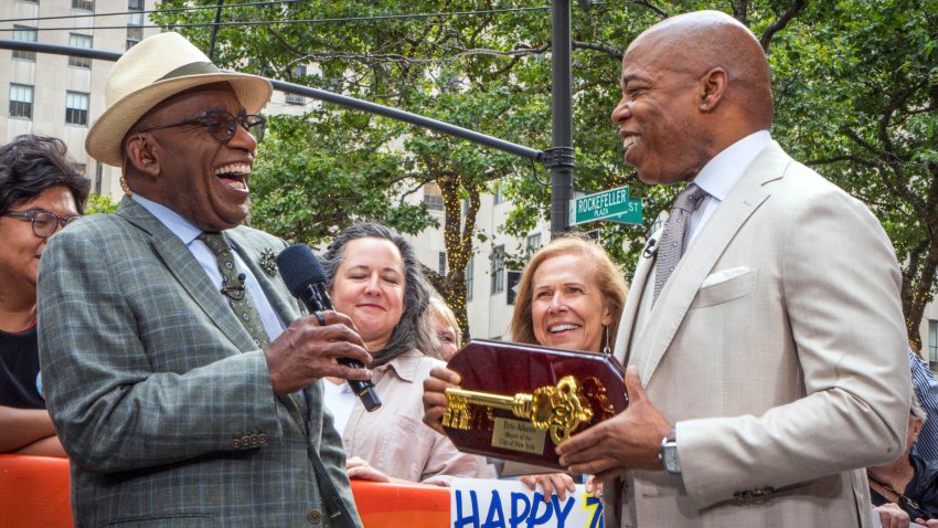 This photo provided by the Office of the Mayor of New York, shows New York Mayor Eric Adams, right, as he presents a Key to the City to Al Roker during the NBC-TV “Today” television program, in New York, Tuesday, Aug. 20, 2024. (Caroline Rubinstein-Willis/Mayoral Photography Office via AP)