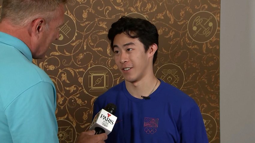 Nathan Chen speaks to reporters