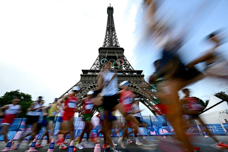 Athletes compete in the men's 20km race walk of the athletics event at the Paris 2024 Olympic Games at Trocadero in Paris on August 1, 2024