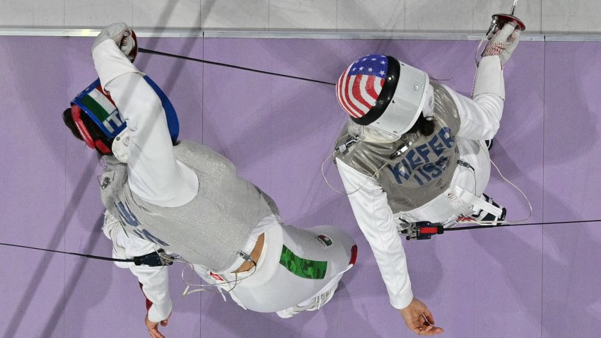 An overview shoes Italy’s Alice Volpi (L) and US’ Lee Kiefer (R) competing in the women’s foil team gold medal bout between Italy and USA during the Paris 2024 Olympic Games at the Grand Palais in Paris, on August 1, 2024. (Photo by Franck FIFE / AFP) (Photo by FRANCK FIFE/AFP via Getty Images)