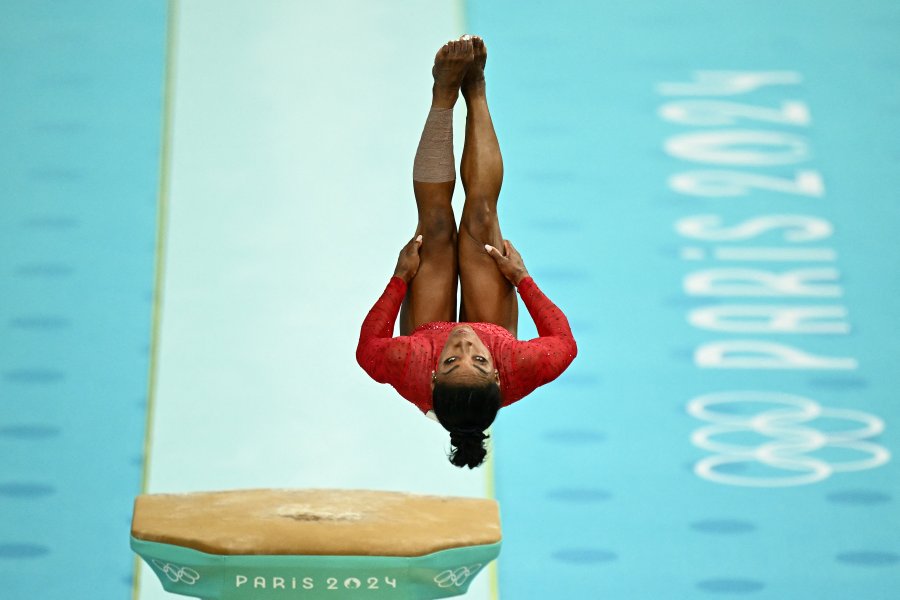 Simone Biles competes in the artistic gymnastics women's vault