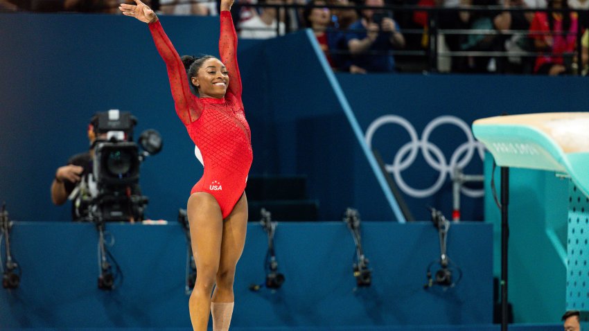 Simone Biles of Team United States celebrates after finishing her routine during the Artistic Gymnastics Women's Vault Final on day eight of the Olympic Games Paris 2024 at Bercy Arena on August 03, 2024 in Paris, France. ((Photo by Rodolfo Buhrer/Eurasia Sport Images/Getty Images)