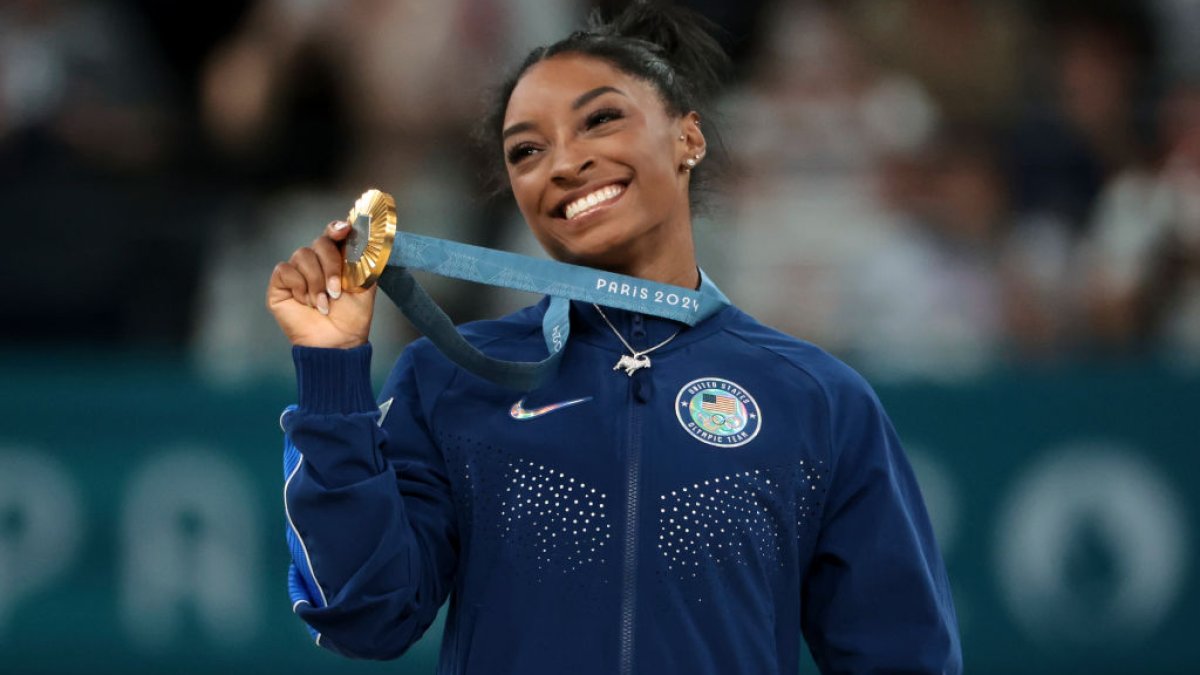 Simone Biles responds to husband Jonathan Owens wearing gold medal
