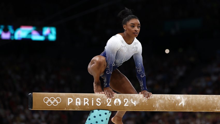 Simone Biles of Team United States reacts after falling while competing during the Artistic Gymnastics Women’s Balance Beam Final on day ten of the Olympic Games Paris 2024 at Bercy Arena on August 05, 2024 in Paris, France.