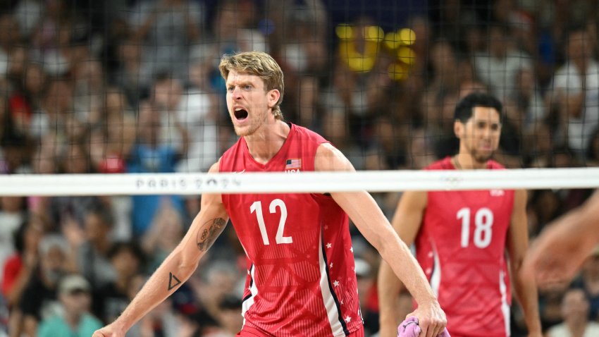 USA’s Maxwell Holt (N°12) reacts during men’s volleyball bronze medal match between Italy and USA at the South Paris Arena 1 in Paris on August 9, 2024 during the Paris 2024 Olympic Games. (Photo by Natalia KOLESNIKOVA / AFP) (Photo by NATALIA KOLESNIKOVA/AFP via Getty Images)