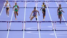 PARIS, FRANCE - AUGUST 06: Sydney McLaughlin-Levrone of Team United States competes during the Women's 400m Hurdles Semi-Final on day eleven of the Olympic Games Paris 2024 at Stade de France on August 06, 2024 in Paris, France. (Photo by Steph Chambers/Getty Images)