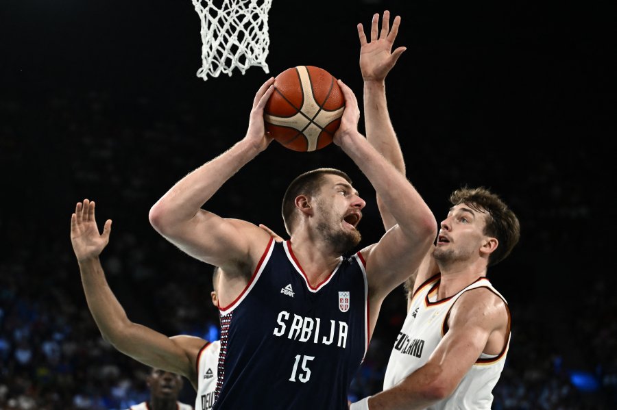 Nikola Jokic handles the ball