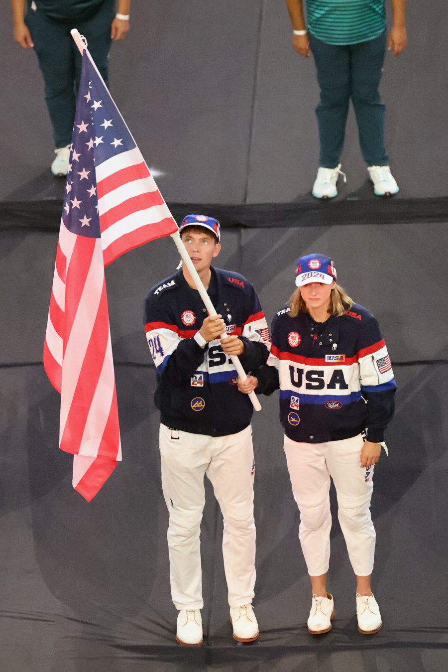 Flagbearers Nick Mead and Katie Ledecky of Team United States