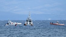 Rescue boats operate off Porticello, on August 20, 2024 near Palermo a day after the British-flagged luxury yacht Bayesian sank. 