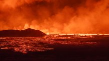 Lava and smoke erupting from a volcano near Grindavik on the Icelandic peninsula of Reykjanes.