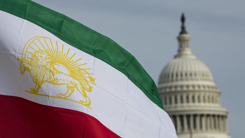 United States Capitol building and an Iranian flag are seen at the photo exhibition organized by the Iranian-American community and supporters of the Iranian Resistance at the National mall in Washington D.C., United States.