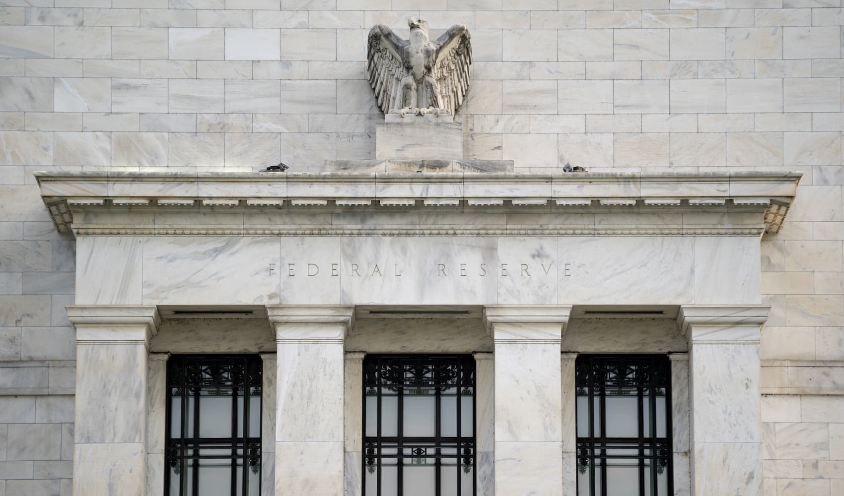 Federal Reserve cuts key rate by sizable half-point, signaling end to its inflation fight