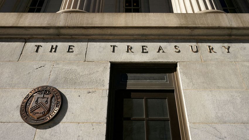 A view shows a bronze seal beside a door at the U.S. Treasury building in Washington, U.S., January 20, 2023. 