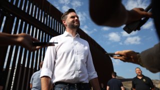 Republican vice presidential nominee Sen. JD Vance of Ohio speaks to reporters in San Diego in front of the wall on the border with Mexico, Sept. 6, 2024.