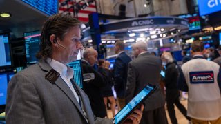 Traders work on the New York Stock Exchange (NYSE) floor on September 13, 2024, in New York City.