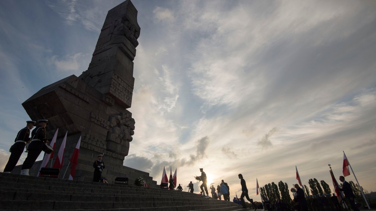 Poland holds a state burial for more than 700 victims of Nazi Germany's World War II massacres