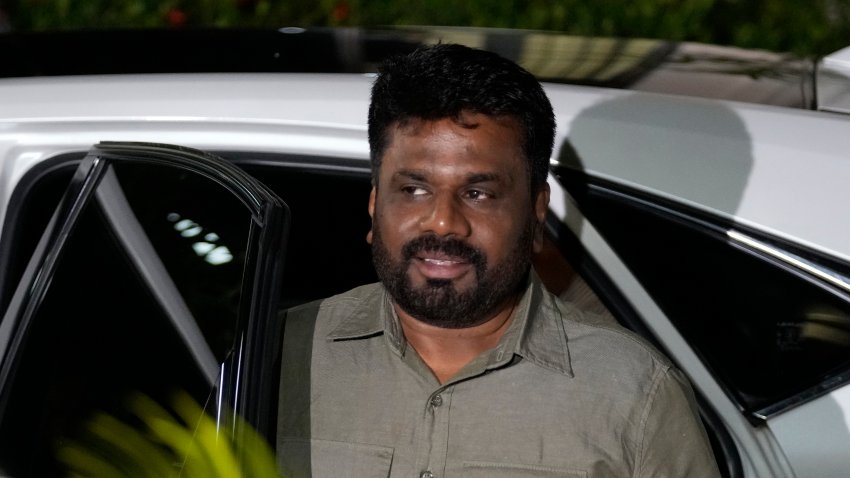 Marxist lawmaker Anura Kumara Dissanayake arrives at the election commission office after winning Sri Lankan presidential election, in Colombo, Sri Lanka, Sunday, Sept. 22, 2024.