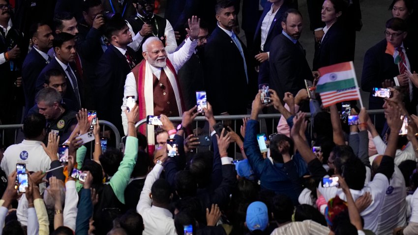 India PM Modi waves at the crowd in Nassau County.