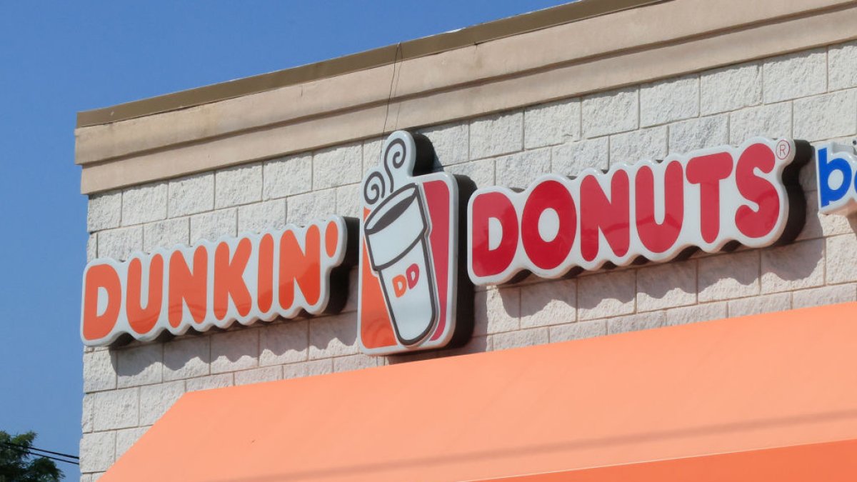 Dunkin’ is offering a free coffee and debuting coffeescented merch for