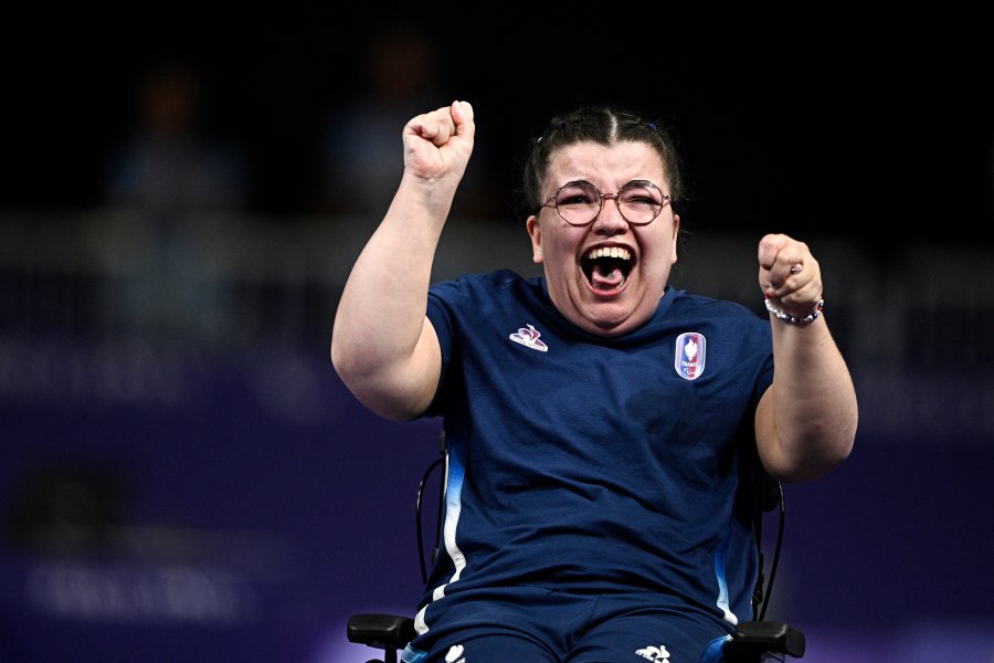 France’s Aurelie Aubert reacts as she competes against Singapore's Yee Ting Jeralyn Tan in the women's Individual BC1 Boccia gold medal match during the Paris 2024 Paralympic Games at the South Paris Arena in Paris on September 2 2024