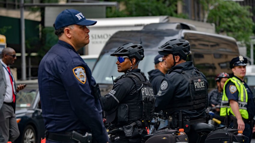 Secret Service and New York Police Department (NYPD) officers near the United Nations (UN) headquarters ahead of the United Nations General Assembly (UNGA) in New York, US, on Monday, Sept. 23, 2024. New York has declared gridlock alert days for all of this week as more than 140 world leaders are expected to arrive in the city, saying that average vehicle speeds in Midtown during past UN General Assembly meetings have averaged less than four miles per hour. Photographer: Jeenah Moon/Bloomberg via Getty Images