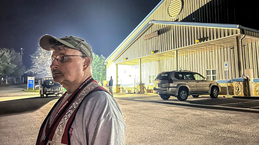 Red Cross Shelter Supervisor Mike McDaniel of greater Carolinas Region Disaster Services arrives at the Ag Center in Asheville, N.C. Sunday, Sept. 28, 2024.