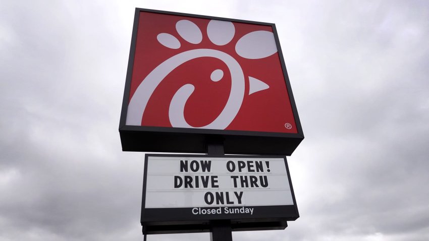 A sign hangs outside of a Chick-fil-A restaurant on May 06, 2021 in Chicago, Illinois. 