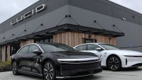 Brand new Lucid electric cars sit parked in front of a Lucid Studio showroom on May 24, 2024 in San Francisco, California. 