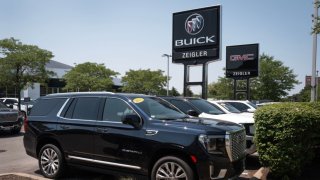 Vehicles are offered for sale at a GM dealership in Lincolnwood, Illinois, on June 20, 2024.