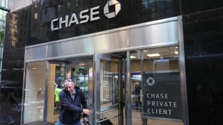 A person walks out of a Chase Bank on October 11, 2024 in New York City. 