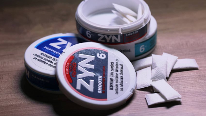 Zyn nicotine cases and pouches are seen on a table in New York City on Jan. 29, 2024.