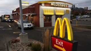 Customers pass in the Drive Thru lane during breakfast hours at a McDonald’s restaurant on October 23, 2024 in Omaha, Nebraska.