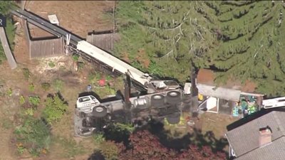 Crane tips over while trimming trees in Sudbury