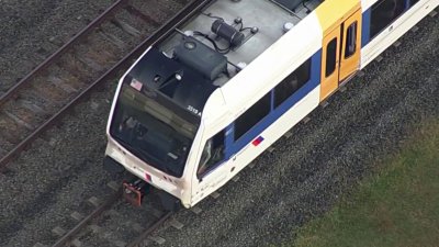 Packed NJ Transit River Line train collides with truck