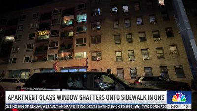 Glass panel shatters onto sidewalk in Queens