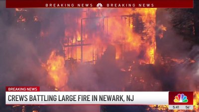 Crews battling massive, intensive fire in Newark burning three homes