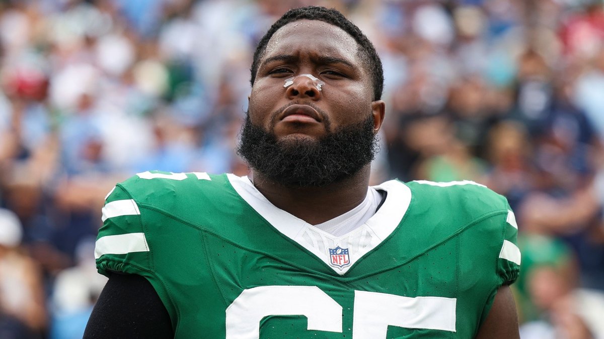 Jets OL Xavier Newman-Johnson carted off with apparent neck injury ...